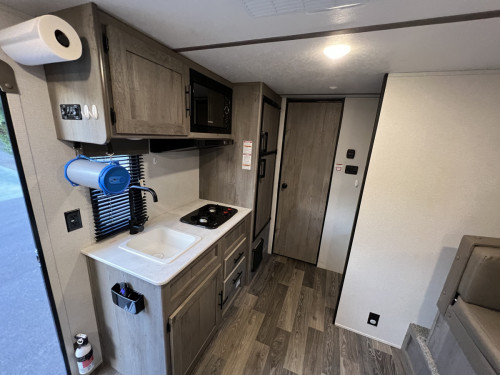 Interior view of kitchen and bathroom door